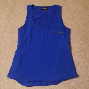 Blue blouse with zippers and zipper breast pocket